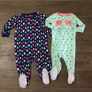 Two Carter’s zip up onesie pajamas
